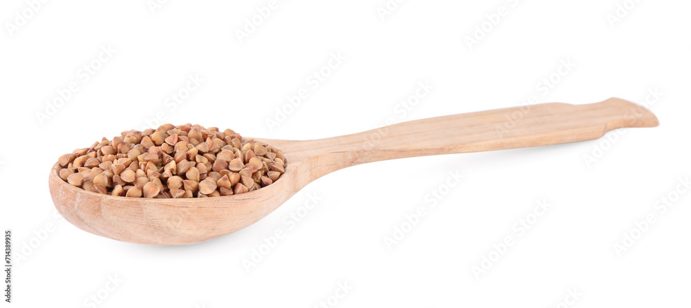Spoon with raw buckwheat isolated on white Spoon with raw buckwheat isolated on white