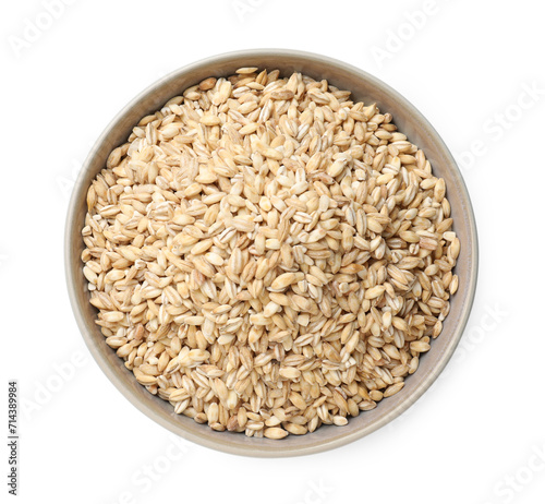 Dry pearl barley in bowl isolated on white, top view