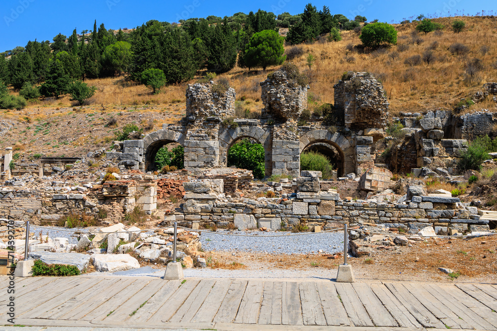 Ancient ruins of an aqueduct in the city of Ephesus. Background with selective focus and copy space