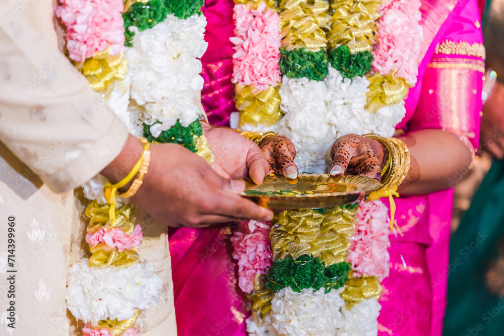 Indian Hindu wedding ceremony ritual items hands close up