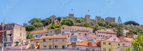 Beautiful views of Saint George Castle and architecture in Lisbon's old city. photo