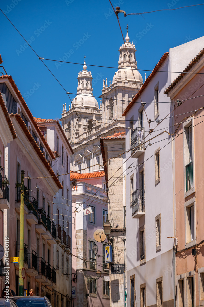Beautiful views towards a majestic cathedral and old architecture in Lisbon's old city.