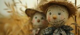Detailed close-up photo of rural scarecrow couple. Female figure stands out, male figure blurred. Rustic appearance with straw details.
