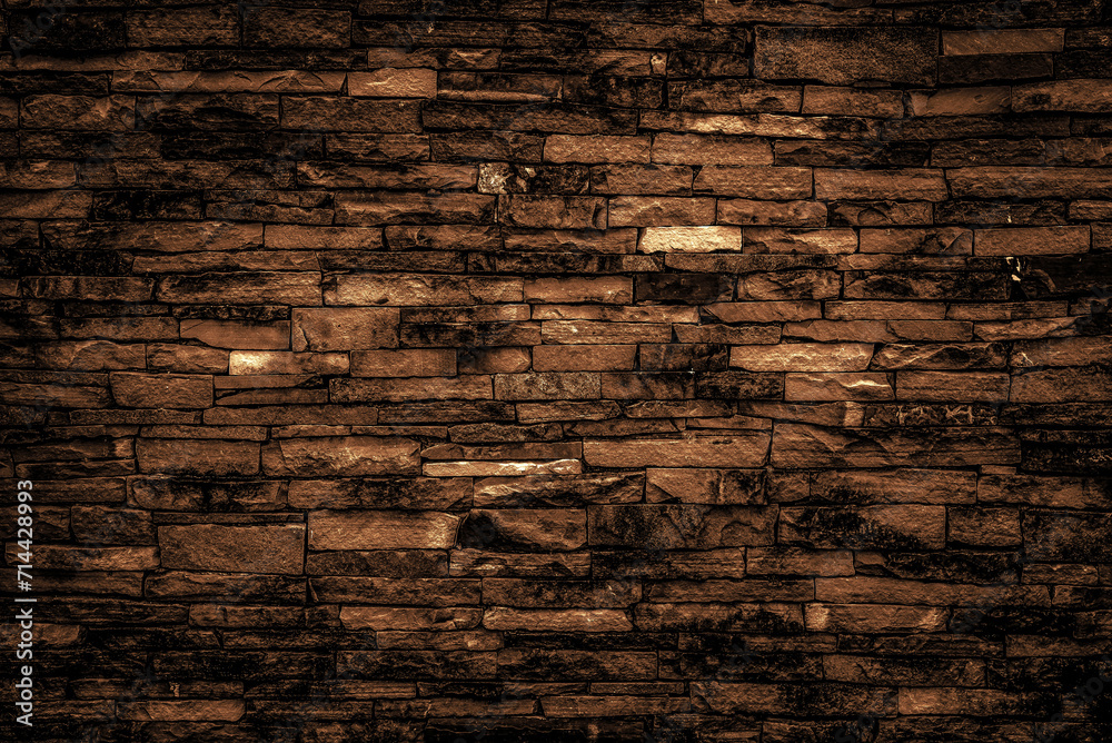 Dark brown bricks wall for abstract brick background and bricks texture.