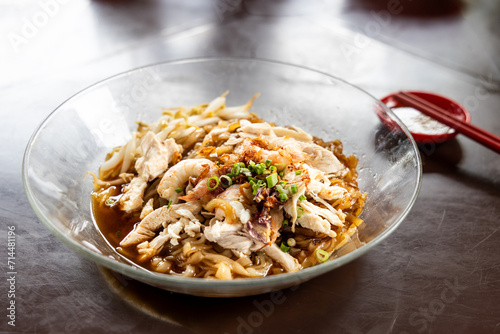 Картината върху платно Ipoh popular dry shredded chicken and prawn hor fun noodle served with chili sauce dipping