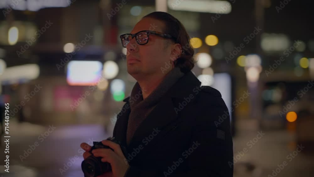 Street Photographer Capturing Pictures of People Traveling at Night Street Photographer Capturing Pictures of People Traveling at Night