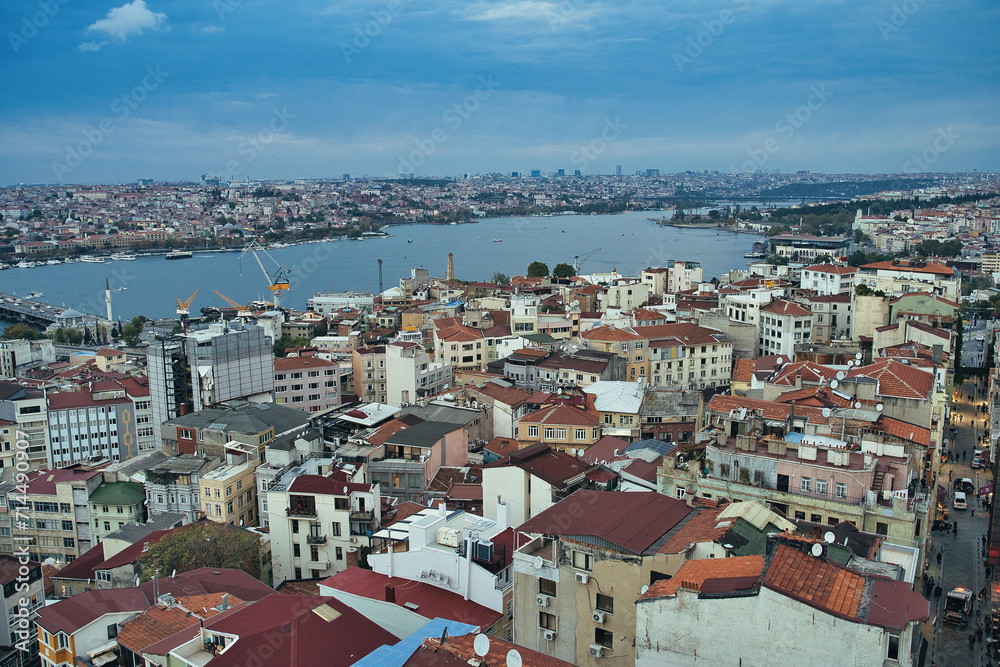 Evening View of the Golden horn waterway between Eminonu and Galata districts as seen from the top of Galata Tower in Istanbul, Turkey