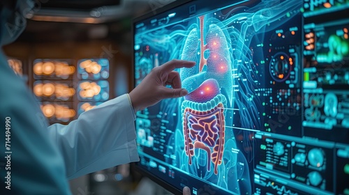 The doctor touching the patient digestive system hologram. photo
