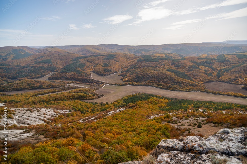 Naklejka premium The autumn landscape of the mountain valley is an amazing, beautiful place at any time of the year. Hiking. Nature