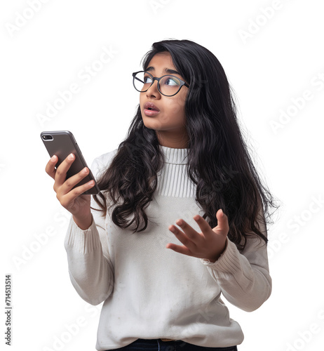 Obraz na płótnie South Asian girl holding a phone while confused and looking away w salonie