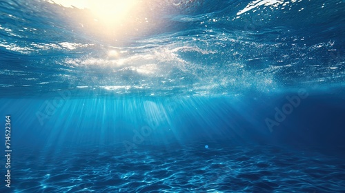 The sun's rays illuminate the bottom of the sea photo