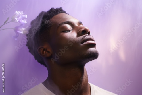 Portrait of a black guy, an African American, with his eyes closed. the sleeping male persona. Dreams, plans for the future and meditation.