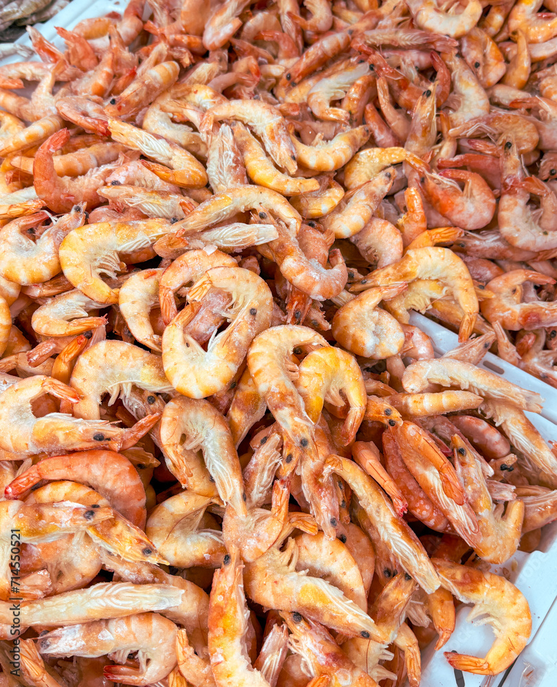 Red shrimp on a shelf in a market Red shrimp on a shelf in a market