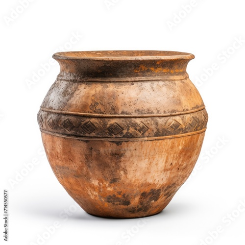 Weathered antique clay pot with abstract tribal patterns.