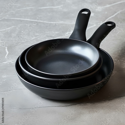 Stacked Black Pans With handle