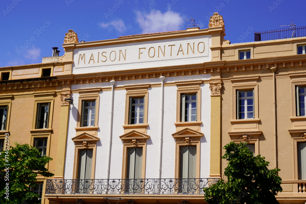 Maison Fontano text french facade entrance sign of historical building on major squares in downtown Perpignan city france
