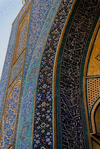 Detail of traditional Persian mosaic wall with floral ornament. West iwan of the courtyard of Jameh or Jame Mosque , Iran's oldest mosque in Isfahan, Iran. UNESCO World Heritage. photo