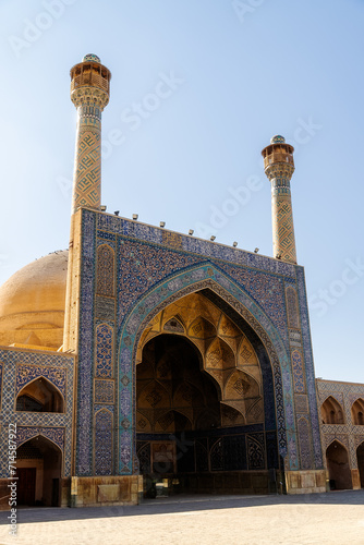 Detail of traditional Persian mosaic wall with floral ornament. West iwan of the courtyard of Jameh or Jame Mosque , Iran's oldest mosque in Isfahan, Iran. UNESCO World Heritage. photo