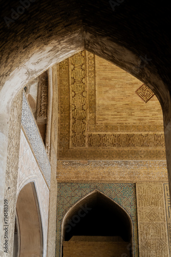 Detail of traditional Persian mosaic wall with floral ornament. West iwan of the courtyard of Jameh or Jame Mosque , Iran's oldest mosque in Isfahan, Iran. UNESCO World Heritage. photo