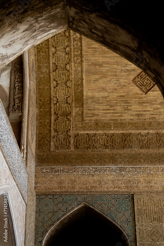 Detail of traditional Persian mosaic wall with floral ornament. West iwan of the courtyard of Jameh or Jame Mosque , Iran's oldest mosque in Isfahan, Iran. UNESCO World Heritage. photo