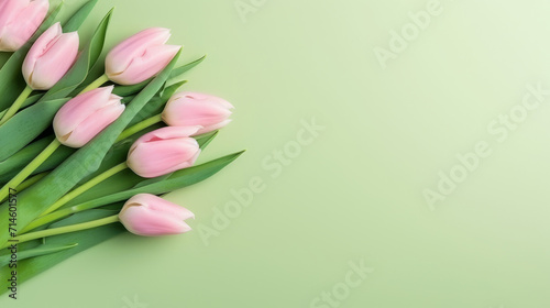 Vibrant Bouquet of colorful tulips. Festive flowers on a green background. Easter and mothers day, International Women's Day
