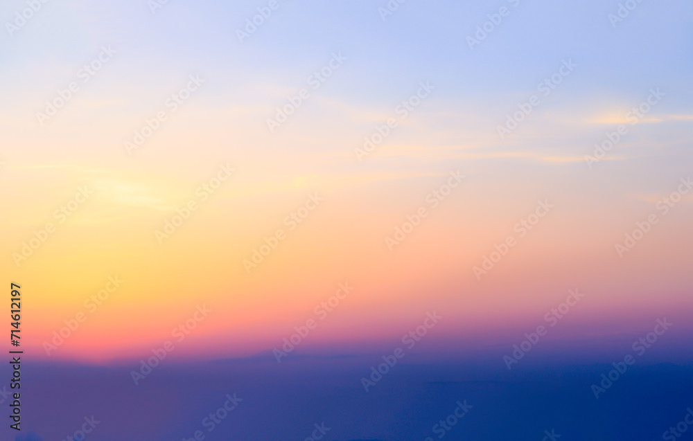 Blue Blurry soft panorama sunset sky background with red pink sun light clouds