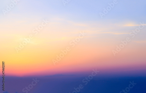 Blue Blurry soft panorama sunset sky background with red pink sun light clouds