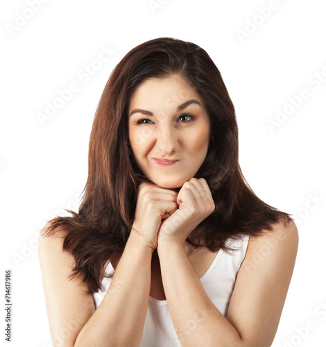 Funny young woman making face