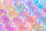Colored crystal balls on a bright pastel background