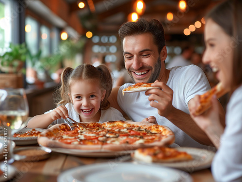 familiy eating pizza a very familiar atmosphere and creates happiness and satisfaction.