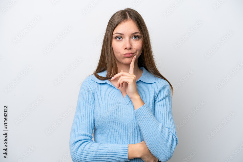 Young Lithuanian woman isolated on white background and thinking Young Lithuanian woman isolated on white background and thinking