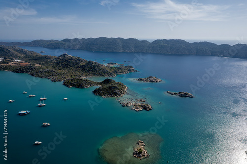 Boats in the bay of Kekova village (Ücagiz) viewed from the drone. Kekova island in Antalya province of Turkey.