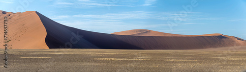 smooth slopes of big red dunes, Naukluft desert near Sossusvlei,  Namibia