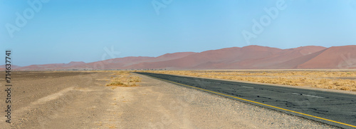 tar road in Tschaub river valley at Naukluft desert, near Sesriem,  Namibia photo