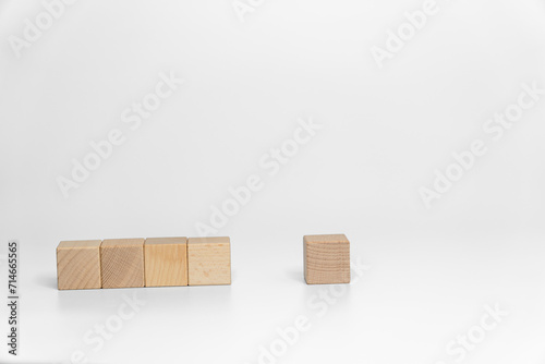 building wood blocks on white background; business or creative concept