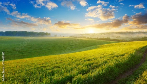 field sunrise and blue sky