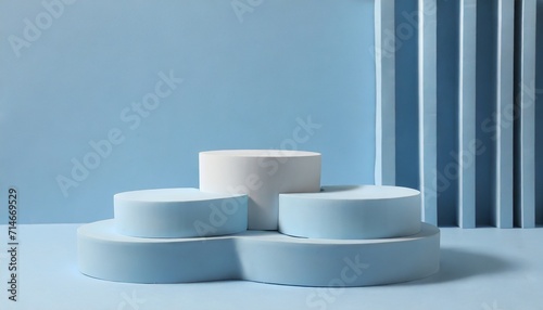 beautiful minimalistic light blue background for product presentation with podiums on different tiers product presentation scene photo