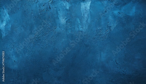 dark blue background grunge blue background with copy space texture of decorative plaster on a concrete wall a long banner with a blue texture of rough grained surface