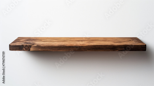 wooden shelf on neutral wall background
