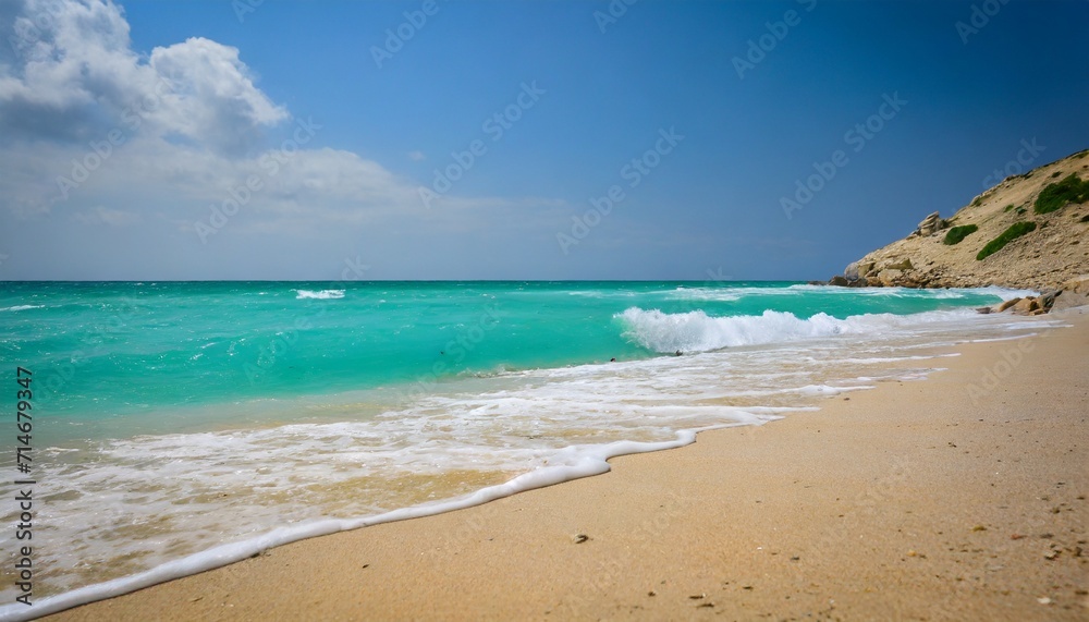 closeup of sandy beach with turquoise sea and sky background high quality photo