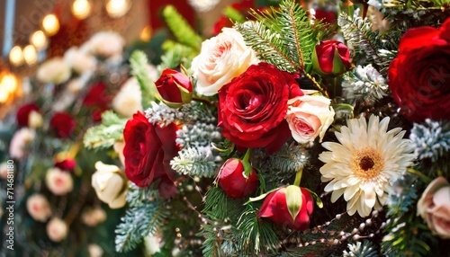 closeup image of beautiful flowers wall background with amazing red and white roses and peonies on the fir branches