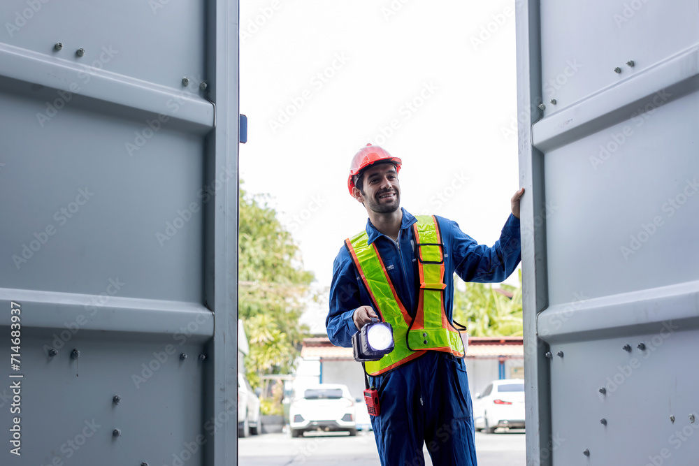 Foreman or worker work at Container cargo site check up goods in container. Foreman or worker checking on shipping containers. Logistics and shipping. Foreman or worker work at Container cargo site check up goods in container. Foreman or worker checking on shipping containers. Logistics and shipping.