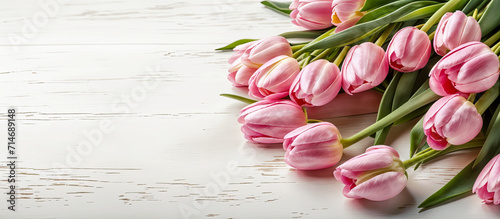 Pink tulips bouqet, spring flowers on white table background. Women's Day, Mother's Day, Valentine's Day panoramic banner, elegant background, copy space. Generative AI. #714689148