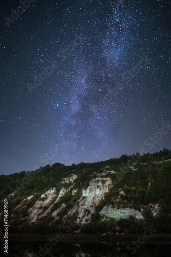 Fototapeta Naklejka Na Ścianę i Meble -  Starry night sky and hill on foreground