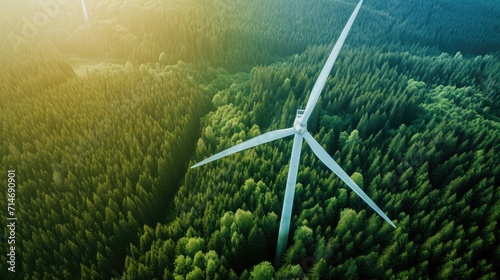 Aerial top down picture of wind turbine a device that converts the wind's kinetic energy into electrical energy providing renewable energy sustainable energy into the electricity grid