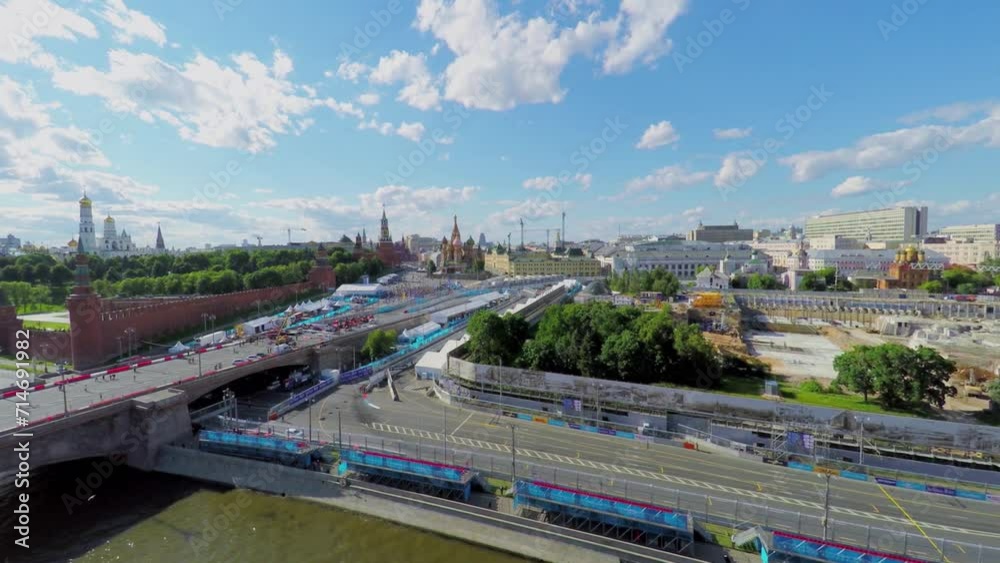 Cityscape with track of Formula E racing on quay Cityscape with track of Formula E racing on quay