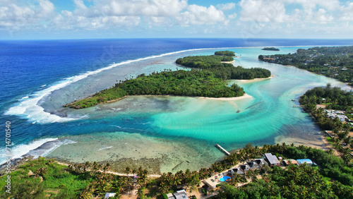 Tropical island coral lagoon beautiful sea view from above. Cook Islands Rarotonga. Cook islands paradise. Beautiful tropical island of Rarotonga view of the blue sea in the lagoon.