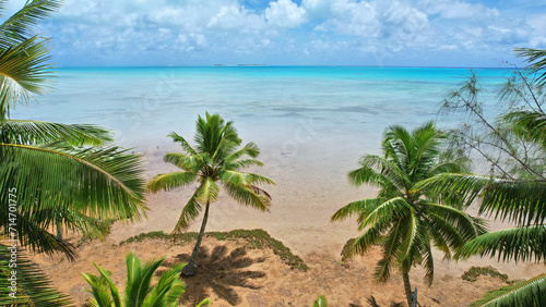 Tropical island coral lagoon beautiful sea view from above. Cook Islands Rarotonga. Cook islands paradise. Beautiful tropical island of Rarotonga view of the blue sea in the lagoon.