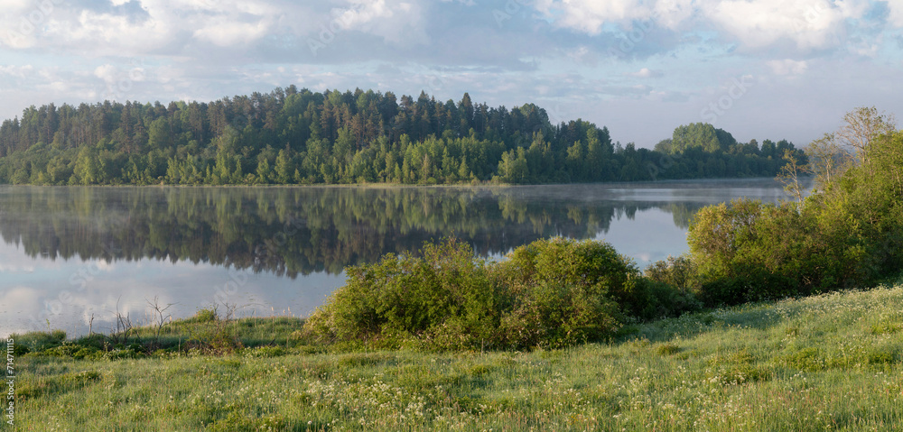 Early June morning on the shore of Lake Ladoga. Karelia, Russia