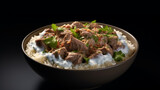 A bowl of Jordanian mansaf, a rich dish of lamb cooked in a tangy yogurt sauce and served with rice